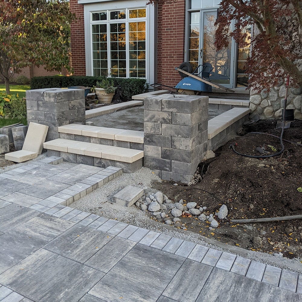 Image of reconstruction work by Bladerunner’s on a residential front door walkway and porch.