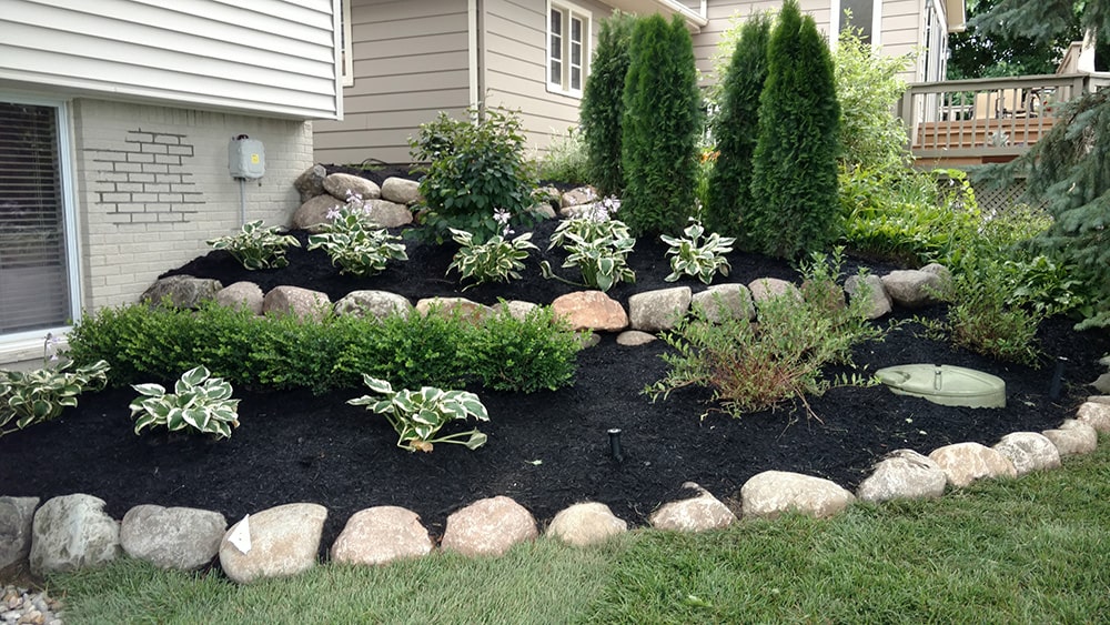 After: Image of the same home, newly landscaped by BladeRunners Landscaping.