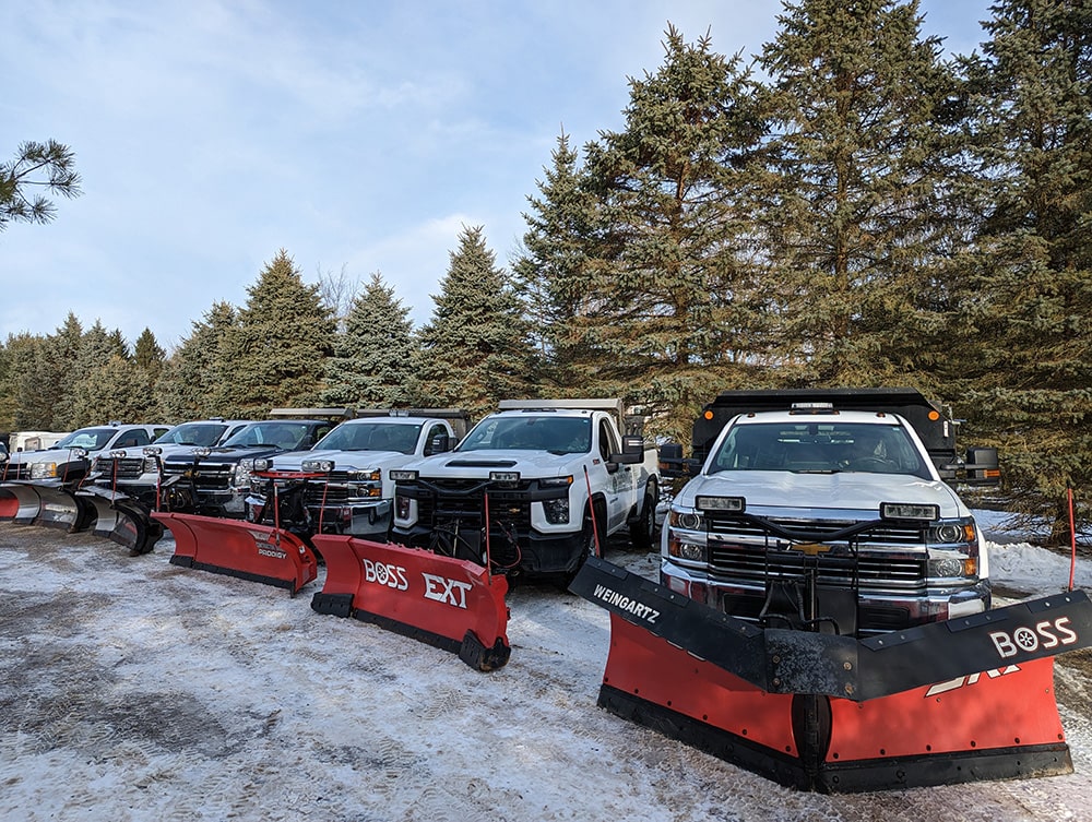 Image of BladeRunners’ snow plow trucks.